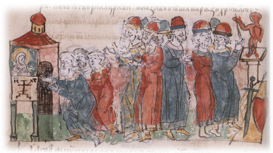 Присяга Игоря и его воинов-язычников на холме перед фигурой Перуна, а христиан — у церкви святого Илии.