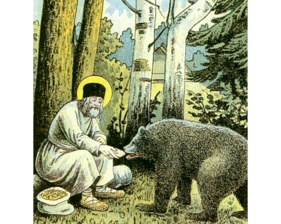 Серафим кормит медведя. Фрагмент литографии Путь в Саров, 1903 год