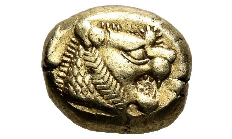 Лидийская монета номиналом в 1/3 статера с изображением головы льва, отчеканенная в VII–VI вв. до н.э. из электрума – сплава золота с серебром
