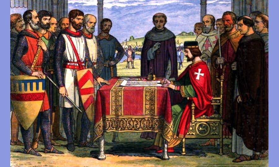 Английский король Иоанн Безземельный подписывает «Великую хартию вольностей».